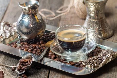 Espresso glass cup with coffee bean Stock Photos