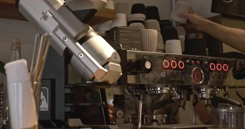 An espresso machine and a coffee grinder in a cafe 動画素材 236596400