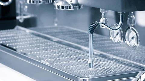Espresso machine in blue tone as background Stock-Fotos