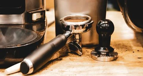 Espresso machine brewing a coffee. Coffee pouring into glasses in coffee sh.. Stock Photos