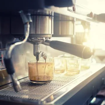 Espresso machine brewing a coffee Stock Photos