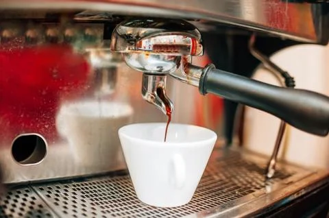Espresso machine making coffee in pub, bar, restaurant. Coffee preparation Stock Photos
