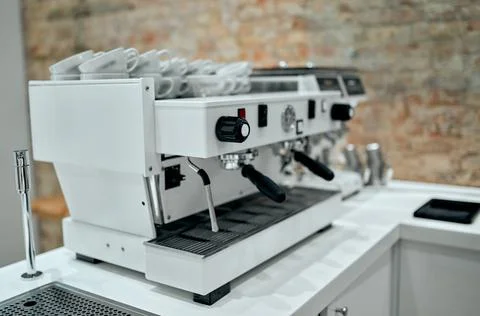 Espresso machine making coffee in pub, bar, restaurant. Stock Photos