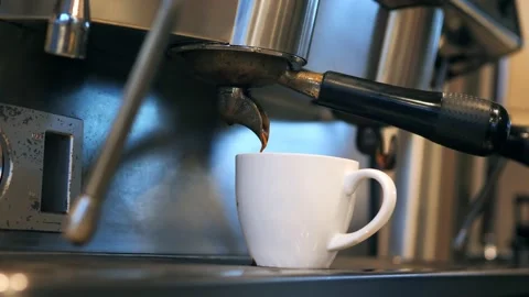 Espresso machine making coffee in the restaurant Stock Footage 149895688