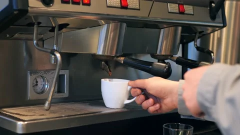 Espresso machine making coffee in the restaurant Stock Footage 149895832
