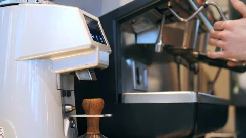 Espresso machine making coffee in the restaurant Stock Footage 149895924