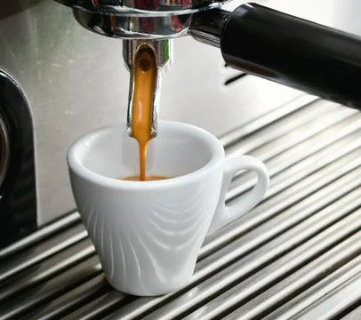 Espresso machine making a cup of coffee. Stockfoto's