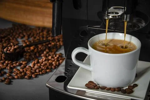 Espresso machine for making fresh coffee on a dark background. Stock Photos