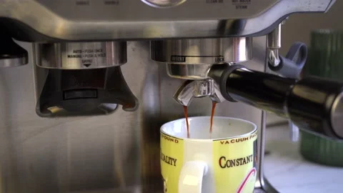 Espresso machine pouring black coffee into cup Stock Footage 208328719