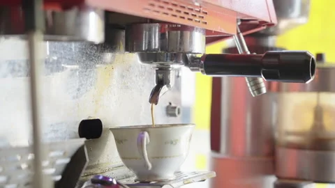 Espresso machine pouring coffe in cup Stock Footage 194732899