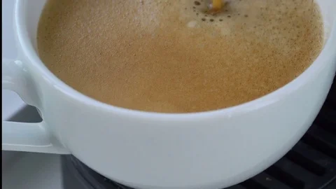 Espresso machine pouring coffee in cup Stock Footage 74675258