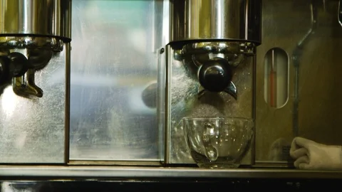 Espresso machine pours coffee into clear glass mug in a coffee shop 02 Stock Footage 122585536