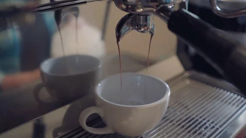 Espresso Machine Running with Espresso Coming Out of the Portafilter Stock Footage 78825959