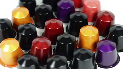 Espresso pods rotating on white background Vídeo Stock 40345037