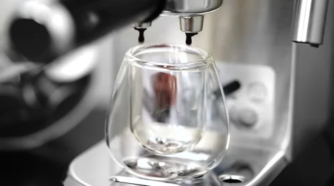 Espresso poured into a glass Stock Footage