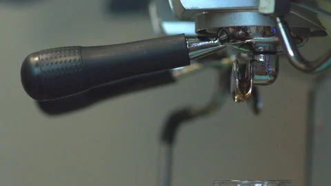 Espresso pouring from coffee machine at cafe Video stock 99115440