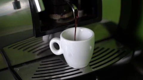 Espresso pouring from coffee machine Stock Footage 124140717