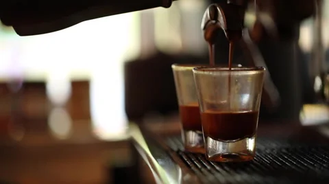 Espresso pouring from machine to cup Stock Footage 47006337