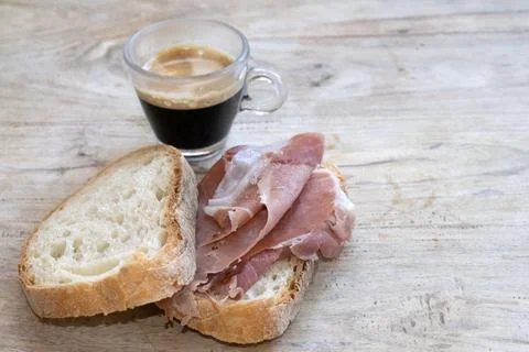 Espresso prosciutto bread breakfast concept Stock Photos