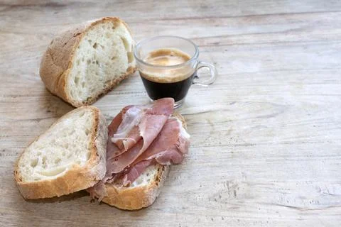 Espresso prosciutto bread breakfast concept Stock Photos