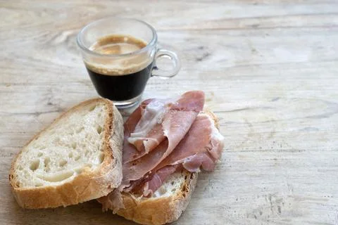 Espresso prosciutto bread breakfast concept Stock Photos