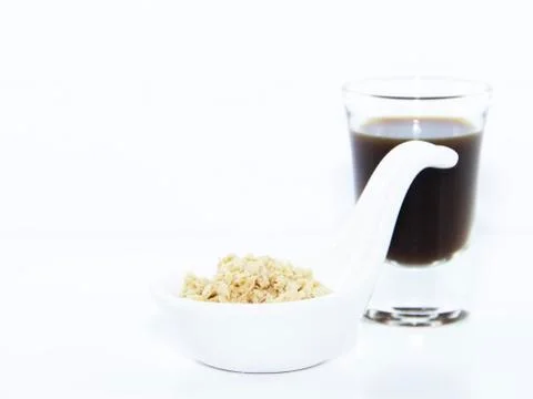 Espresso shot with oat cracker Stock Photos