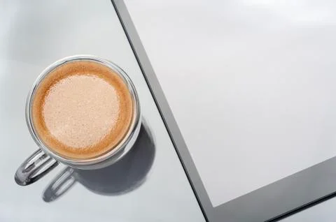 Espresso with tablet Stock Photos