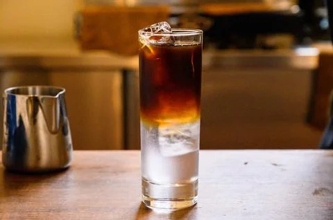 Espresso tonic refreshing layered cold drink with ice Stock Photos