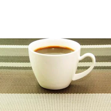 Espresso in white cup on tablemat Stock Photos