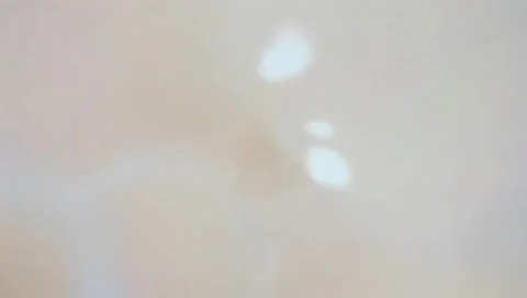 Essence with many atoms floating in drops. Design collagen bubbles. Stock Footage 300020369