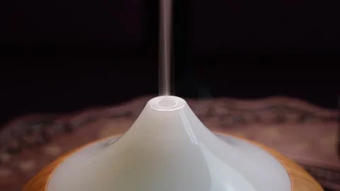 Essences diffuser and essential oil spread into ambient. Essential oil smoke Video stock 144246975