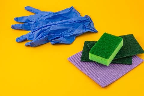 Essential cleaning tools on a bright table surface Stock Photos