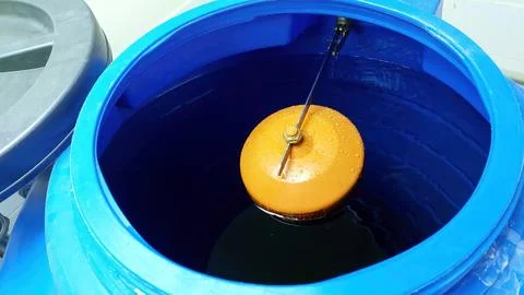 Essential Function of a Water Valve Float Controlling Water Levels in a Tank Stock Photos
