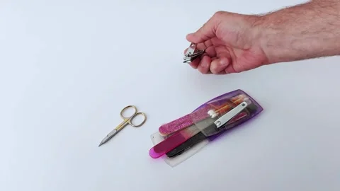 Essential Manicure Tools- Hand-Held Clippers and Grooming Kit Stock Footage 311974291