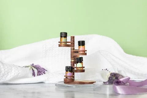 Essential oil bottles for composing various perfume fragrances on natural Stock Photos