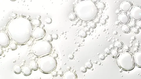 Essential oil bubbles, macro shot, cosmetics concept. Liquid bubbles, fluid.. Stock Footage 305073114