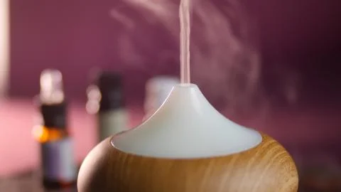 Essential oil diffuser, beautiful shot with nice red light and smooth background Stock Photos