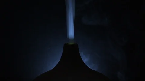 Essential Oil Diffuser Glowing With White Light Continuously Releasing Stock Footage 123167896