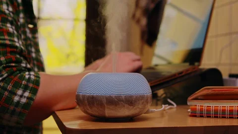 Essential oil diffuser on the table Stock Footage 128822087