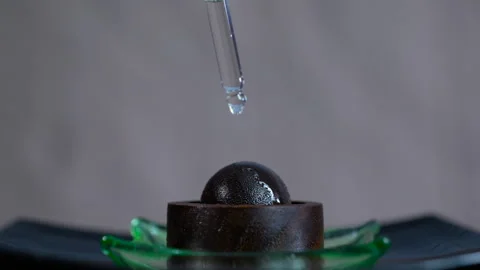 Essential oil dripping from an aromatherapy dropper 库存影片 334322098