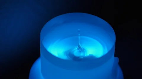 ESSENTIAL OIL DROPS FALLING INTO A DIFFUSER 스톡 동영상 128570455