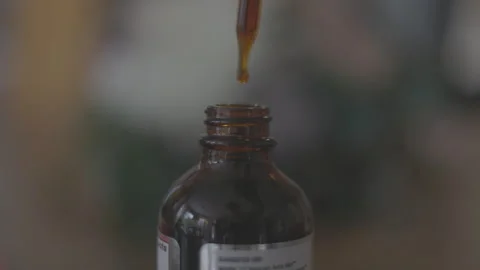 Essential oils bottle and dropper Video stock 273120592
