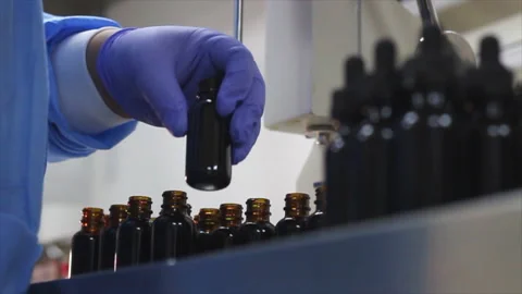Essential Oils Bottle Dispenser in Lab Stock Footage 199346311