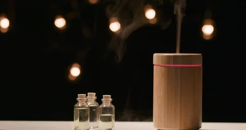 Essential oils diffuser showing bottles of oil Video stock 123138957
