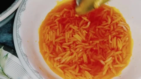 Essential Techniques Coloring Rice For Traditional Mutanjan Zarda 库存影片 333541823