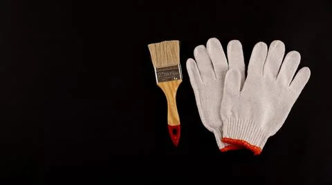 Essential Tools for Painting: paint rollers and tray, brush, masking tape Photos
