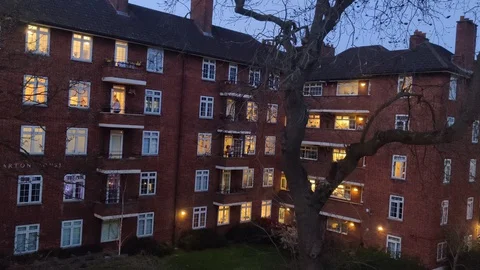 ESSENTIAL WORKERS RECEIVE APPLAUSE DURING COVID-19 UK LOCKDOWN, 4K Stock Footage 127592765