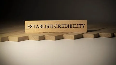 Establish Credibility text. It was taken in the studio written on a wooden .. Stock Photos