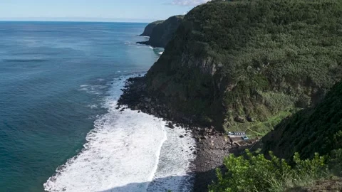 Establish dramatic coast and rocky beach on tropical island, time lapse, tilt up Stock Footage 165730415