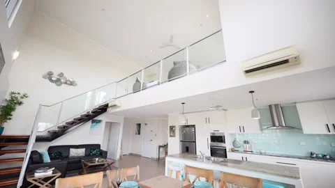 Establish of large two story elegant apartment with open floor plan and Stock Footage 267060192
